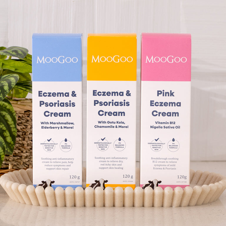 MooGoo Eczema and Psoriasis Cream Marshmallow Elderberry, Eczema and Psoriasis Cream Gotu Kola Chamomile, and Pink Eczema Cream Vitamin B12 in basket, soothing cream for sensitive eczema and psoriasis prone skin