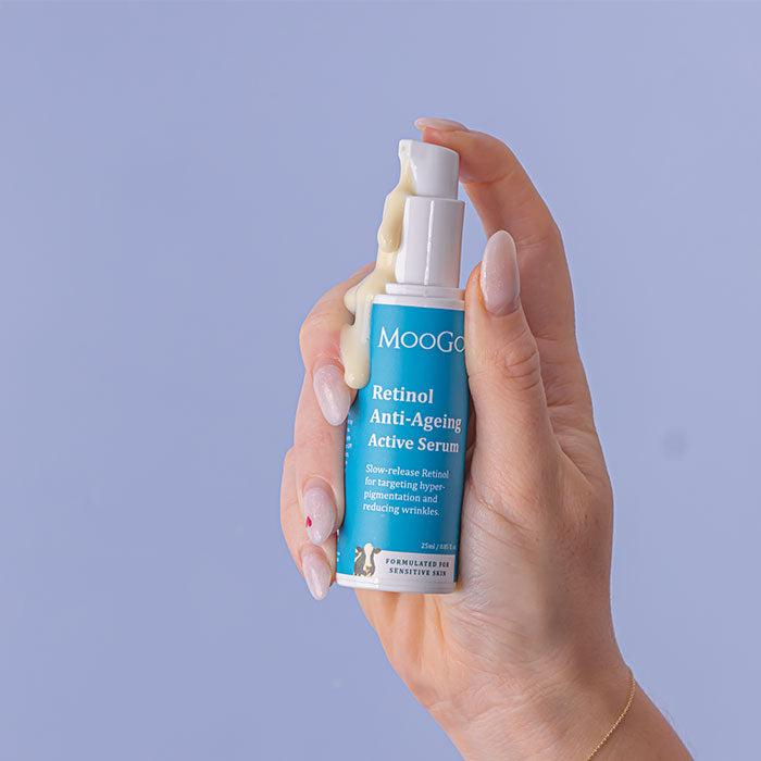 MooGoo Retinol Anti-Ageing Active Serum product in model’s hand, promoting smoother, brighter skin