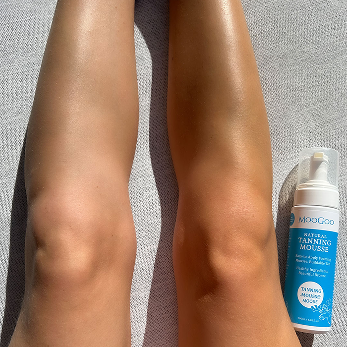 MooGoo Natural Tanning Mousse with leg transformation results, self tanning mousse for smooth golden glow, moisturising with aloe vera and B5.