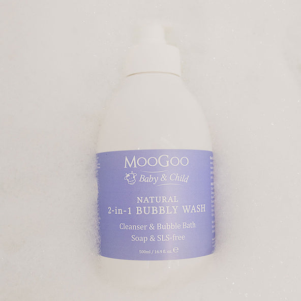Moogoo natural 2 in 1 bubbly wash floating on white bubbles. Soap & SLS free. hypoallergenic.