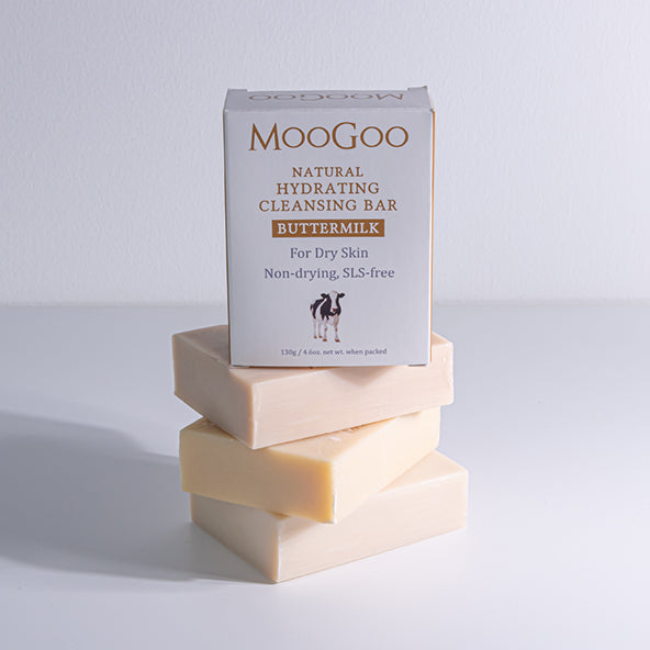 Natural Buttermilk Cleansing Bar by MooGoo, product photo with soap blocks, gentle hydrating soap alternative for dry skin