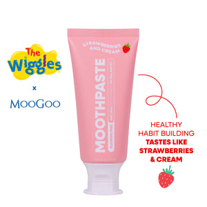 MooGoo x The Wiggles Moothpaste toothpaste tube in strawberries and cream flavour on a white background. The tube is light pink with white text and a white cap. Healthy habit building, tastes like strawberries and cream. Fluoride-free formula, safe for kids.