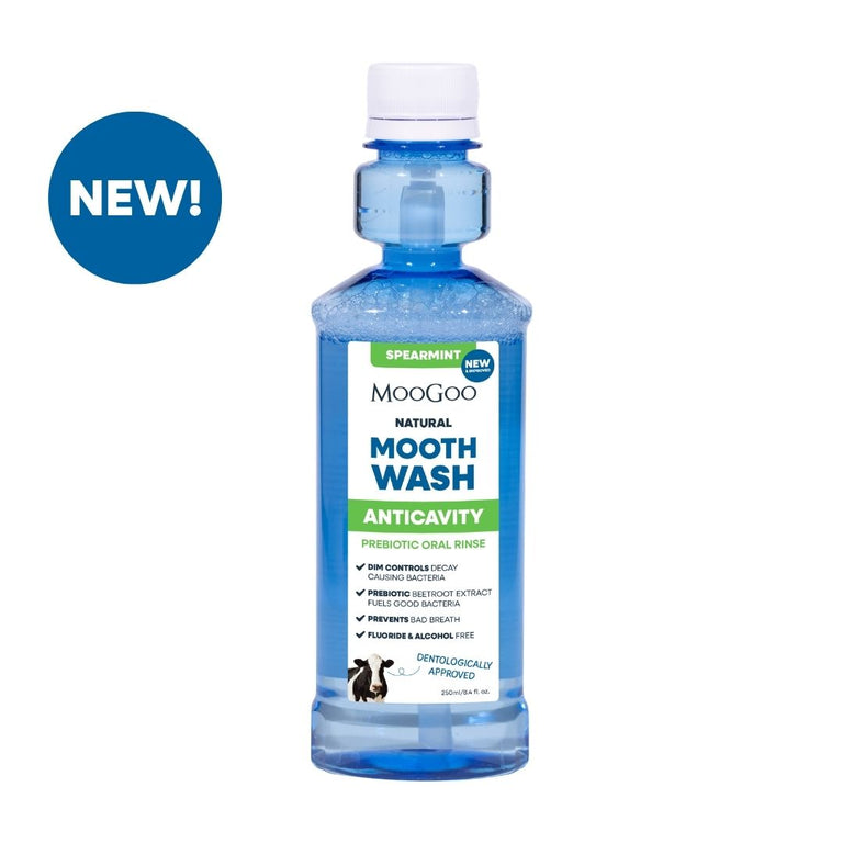 MooGoo Natural Moothwash Spearmint in hygienic blue bottle on white background, gentle alcohol and fluoride free mouthwash for healthy gums
