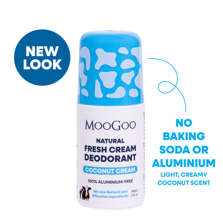 MooGoo Natural Fresh Cream Deodorant roll-on bottle in Coconut Cream scent, featuring a blue and white cow-print cap and white body. Includes a blue 'NEW LOOK' badge on a white background. No Baking Soda or Aluminium. Light creamy coconut scent, with gentle slight alkaline formula to naturally control odour.