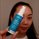 woman holding MooGoo Retinol Anti-Ageing Active Serum, Vitamin A skincare for ageing concerns