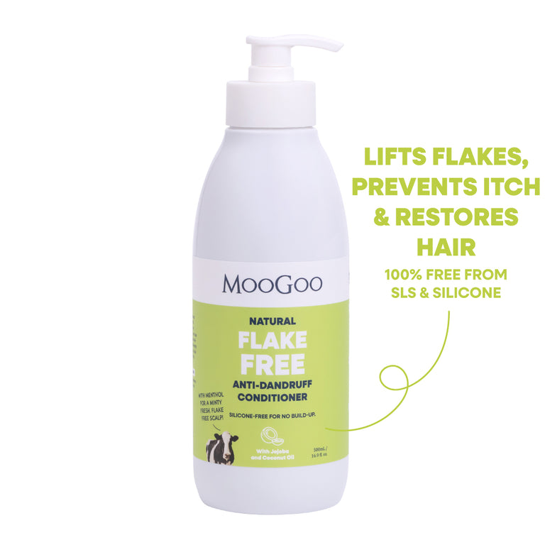 MooGoo Flake Free Anti-Dandruff Conditioner bottle on a white background. Lifts flakes, prevents itch and restores hair. Free from SLS, Sulphates and silicones. Silicone free formula with jojoba and coconut oil to restore dry scalp. 