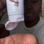 Woman applying MooGoo Skin Milk Udder Cream, natural restorative moisturiser with aloe vera and vitamin E for dry, sensitive or damaged skin.