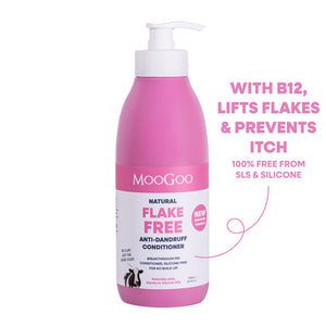 A pink MooGoo Flake Free Anti-Dandruff Conditioner bottle with a white pump dispenser, shown on a white background. Silicone and SLS free formula with jojoba and coconut oil to restore dry scalp, with Vitamin B12. 