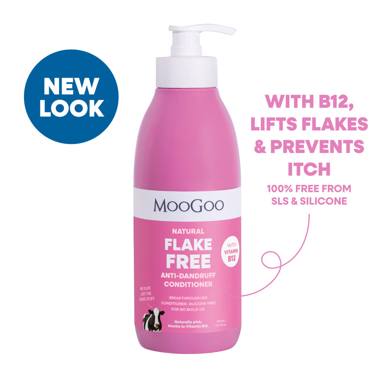 A pink MooGoo Flake Free Anti-Dandruff Conditioner bottle with a white pump dispenser, shown on a white background. Silicone and SLS free formula with jojoba and coconut oil to restore dry scalp, with Vitamin B12. 