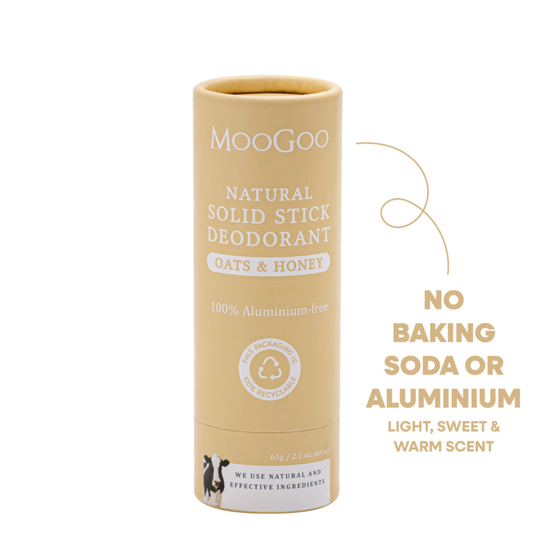 MooGoo Natural Solid Stick Deodorant in Oats & Honey scent, shown in its beige cardboard packaging tube on a white background, aluminium free, natural odour control.