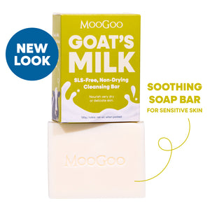 MooGoo Goat's Milk Soothing Cleansing Bar shown with its yellow-green packaging box and the bar itself on a white background, with text reading 'NEW LOOK' and 'SOOTHING SOAP BAR FOR SENSITIVE SKIN'. SLS free, to calm and hydrate delicate or irritated skin.