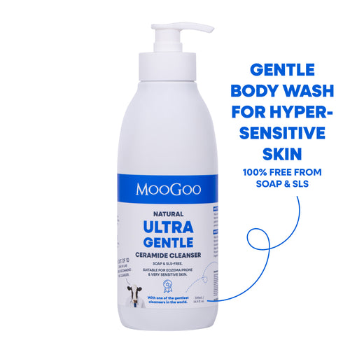 A white pump bottle of MooGoo Natural Ultra Gentle Ceramide Cleanser body wash, shown on a white background with blue promotional text on the right. For eczema prone and hypersensitive skin with ceramides to strengthen skin.
