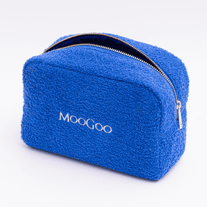 Blue MooGoo Terry Towelling Cosmetics Travel Bag with a gold zipper on a white background.