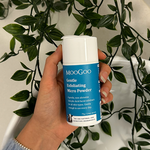 MooGoo Gentle Exfoliating Micro Powder shown in hand, plant-derived exfoliator to deep cleanse pores and smooth skin texture